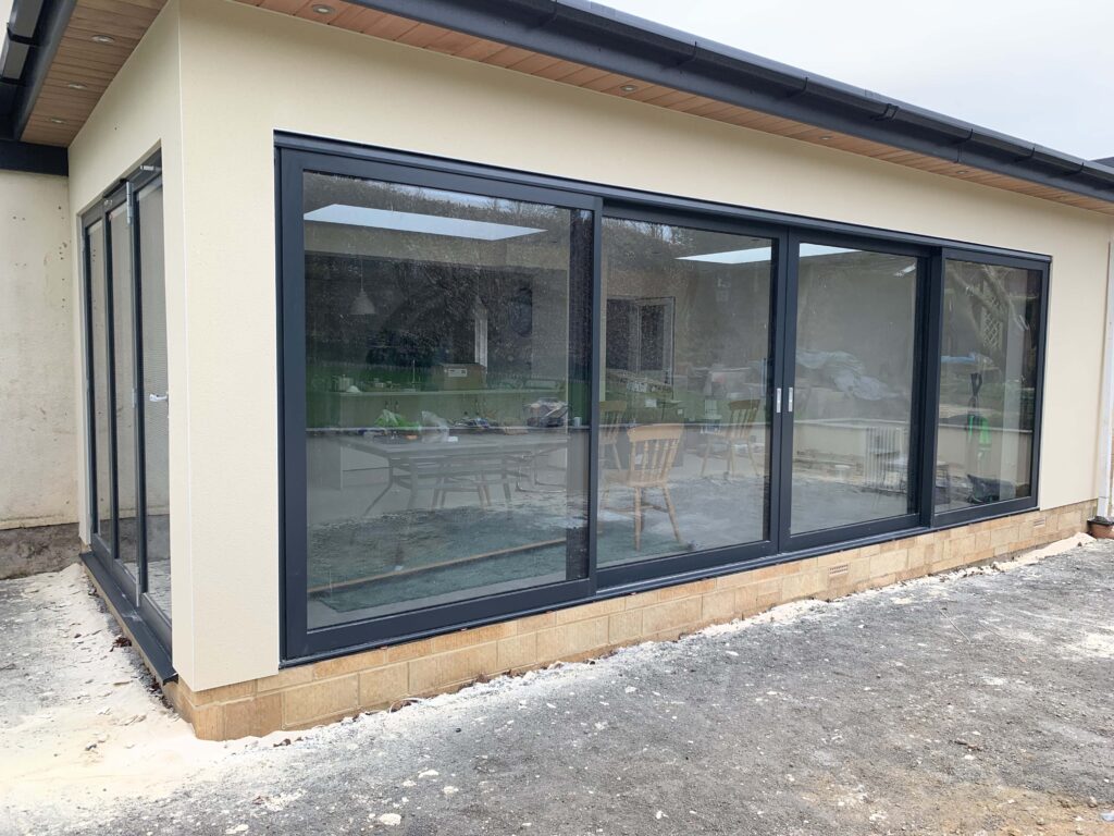 exterior plastering around existing french doors and wall detail to match